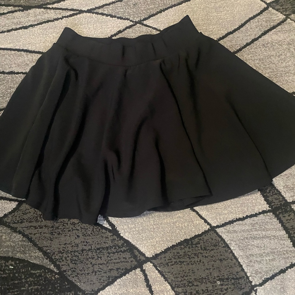 Black tennis skirt with shorts underneath